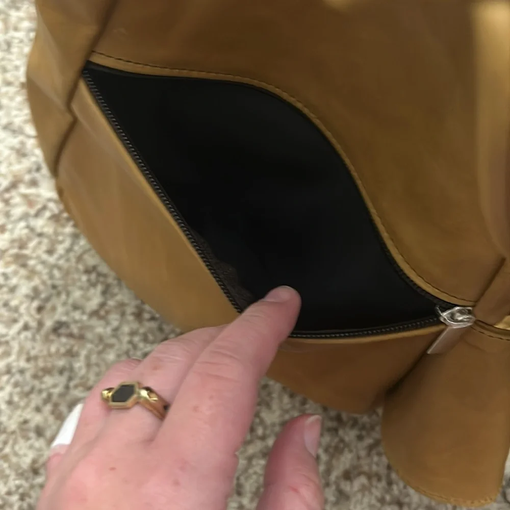 Genuine leather sling backpack